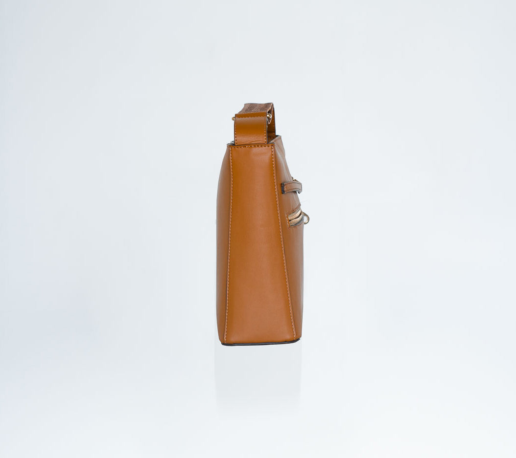 Side view of secure travel handbag showing slim, structured shape