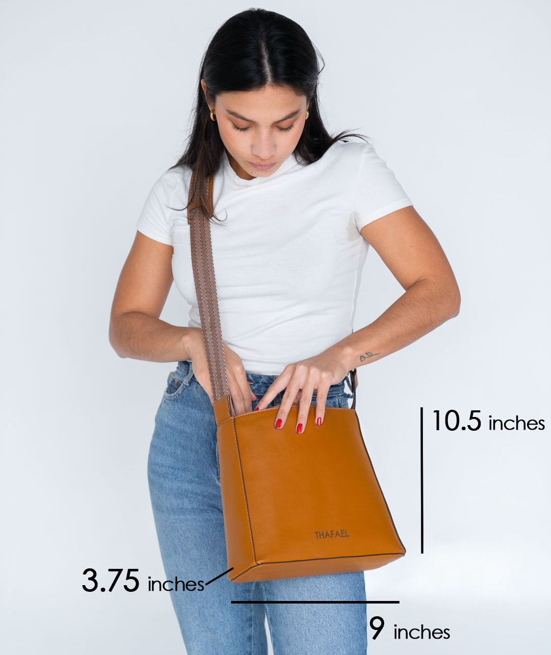 Best bag for travel with clear measurements of height, width, depth, and adjustable strap length shown for reference