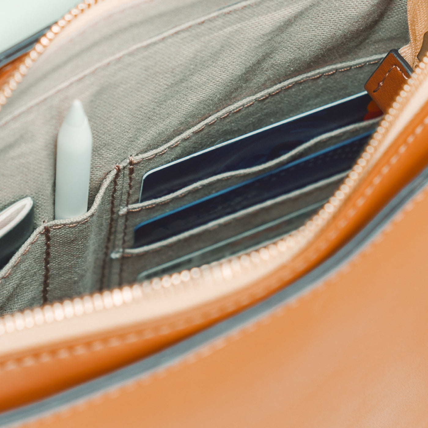 Thafael crossbody bag packed with travel essentials and RFID pockets