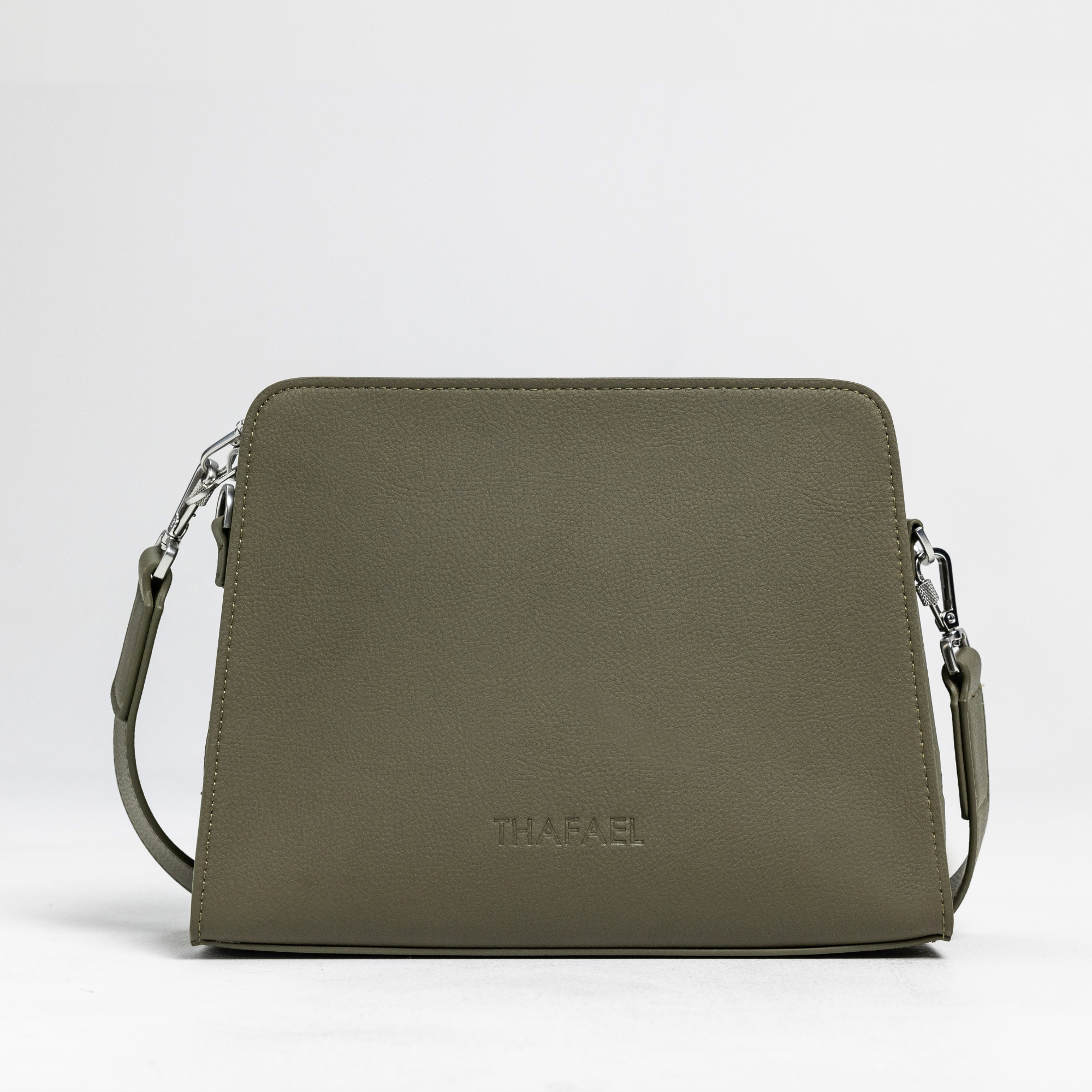 front view of thafael antitheft crossbody travel bag in green olive color