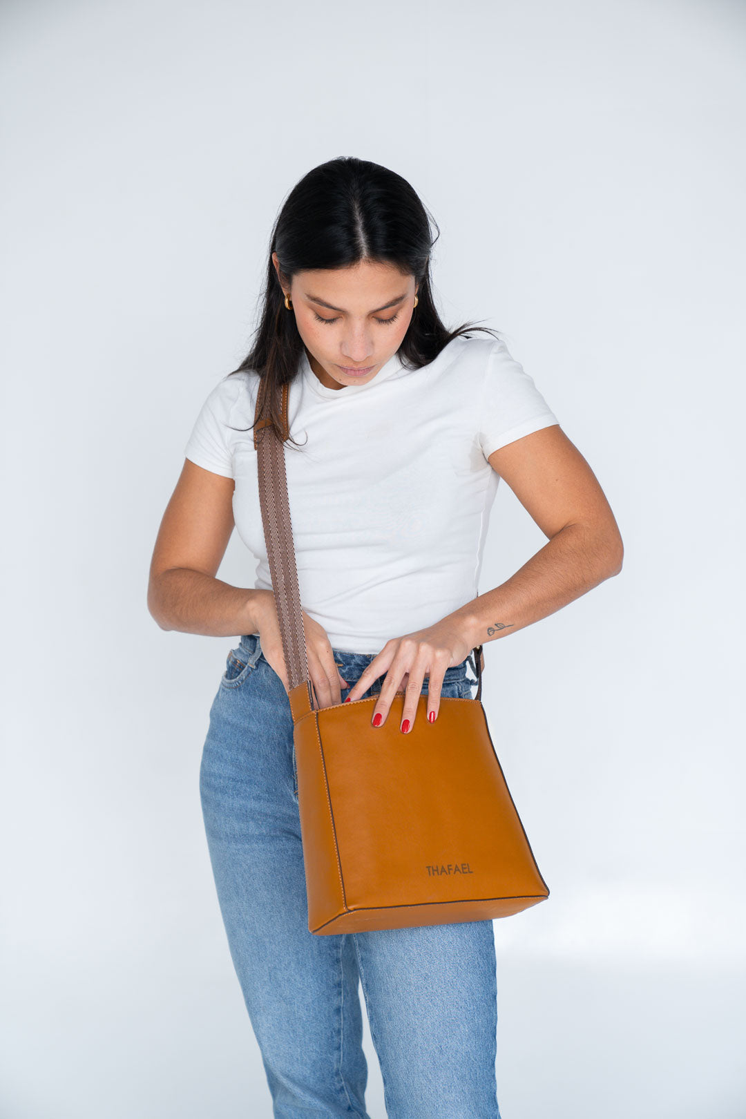Italy travel essentials for women including anti-theft crossbody bag